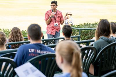 Michael Lauzardo, MD, MSc, an associate professor of infectious diseases and global health, goes over COVID-19 testing, proper PPE use and swabbing instructions with UF College of Medicine students at The Villages® Polo Field. — © University of Florida, Photo by Louis Brems