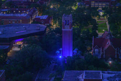 Century Tower on the campus of the University of Florida is awash in blue in honor of National Nurses Week, five months into the COVID-19 pandemic. — © University of Florida, Photo by Louis Brems