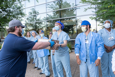 Throughout 2020 and beyond, PPE has been an important commodity. Many members of the community donated PPE to the hospital system, including Bass Pro Shops, which provided 6,000 masks to UF Health Shands Hospital in support of local health care workers. — © University of Florida, Photo by Jesse S. Jones