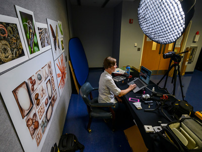 Museum photographer Kristen Grace logs on to her Zoom nature photography camp from one of the museum’s virtual classrooms studios. — ©Florida Museum of Natural History, All Rights Reserved, Photo by Jeff Gage