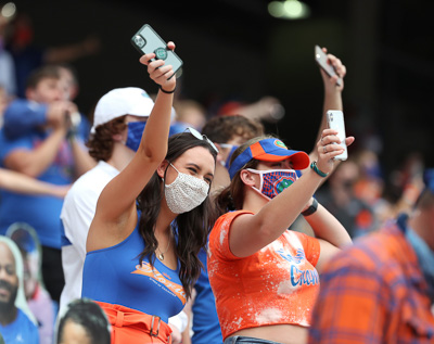 Fans wear masks during the Gators’ game against the South Carolina Gamecocks on Saturday, October 3, 2020, at Ben Hill Griffin Stadium in Gainesville, Florida. — © 2020 University Athletic Association, All Rights Reserved, UAA Communications Photo by Courtney Culbreath