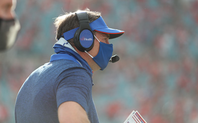 Gators’ Coach Dan Mullen wears a mask on the sidelines during the Gators’ game against the Georgia Bulldogs on Saturday, November 7, 2020, at EverBank Field in Jacksonville, Florida.  — © 2020 University Athletic Association, All Rights Reserved, UAA Communications Photo by Courtney Culbreath