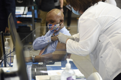 Pictured on Dec. 14, 2020, Dr. Leon L. Haley Jr., a board-certified emergency room physician, CEO of UF Health Jacksonville and dean of the UF College of Medicine – Jacksonville, is thought to be the first in Florida to be vaccinated.