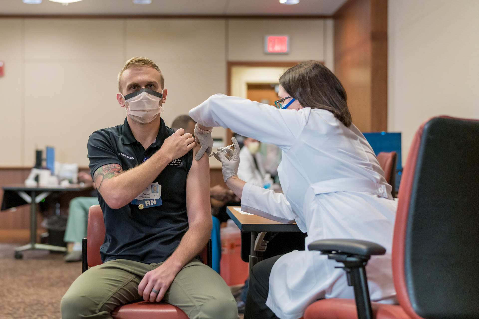 "I think it’s a step toward getting back to some kind of normal," said Samuel J. Overly, B.S.N., R.N.-B.C., a trauma nurse and clinical leader in the UF Health adult emergency department, after receiving the inaugural vaccination.